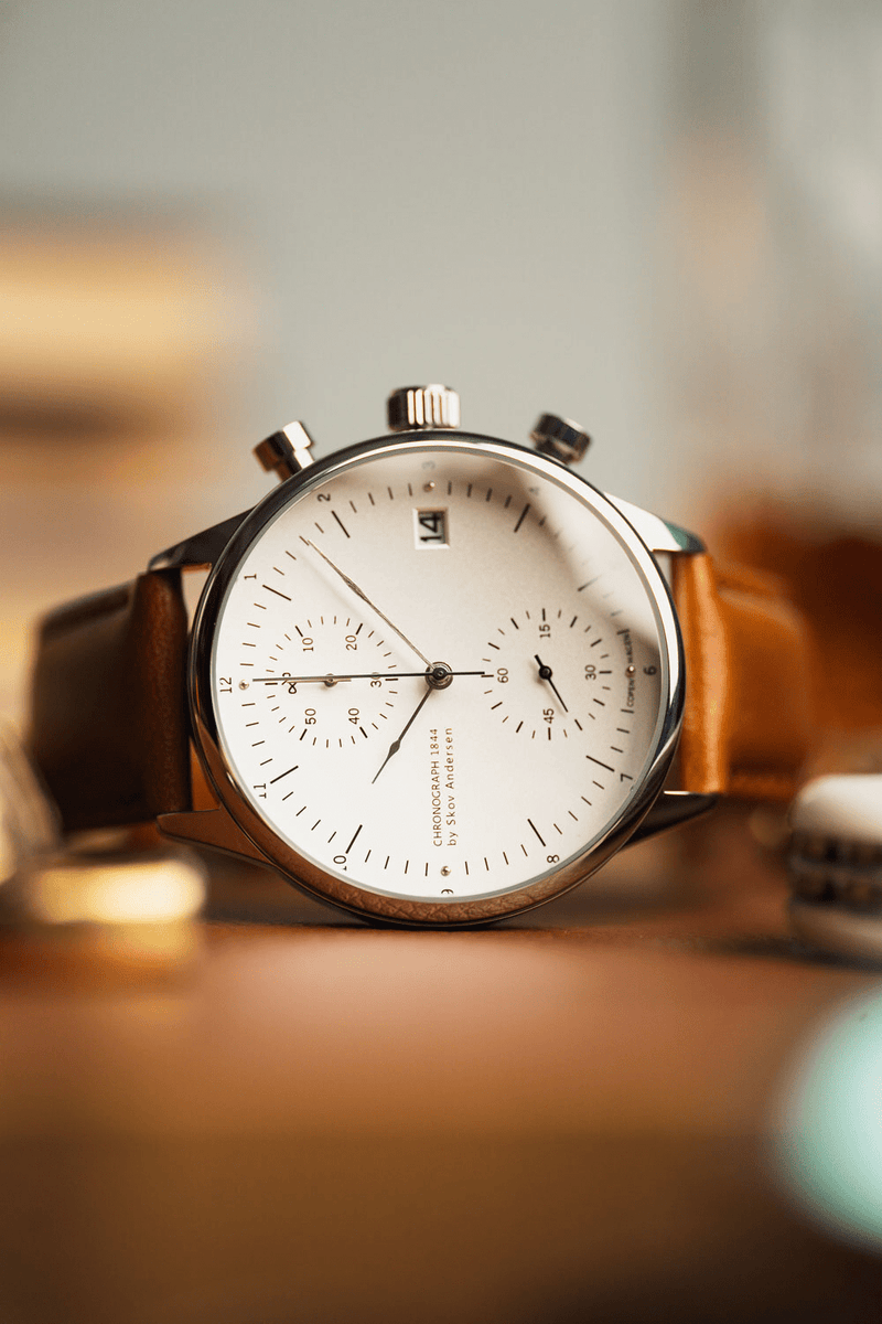 1844 Chronograph by AV86 with vintage-inspired dial, precise timing lines, date window, sapphire crystal, and brown leather strap