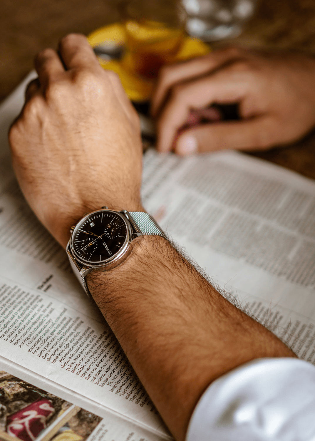1844 Chronograph by AV86 with precision dial, chronograph function, sapphire crystal, and mesh metal strap in a casual setting