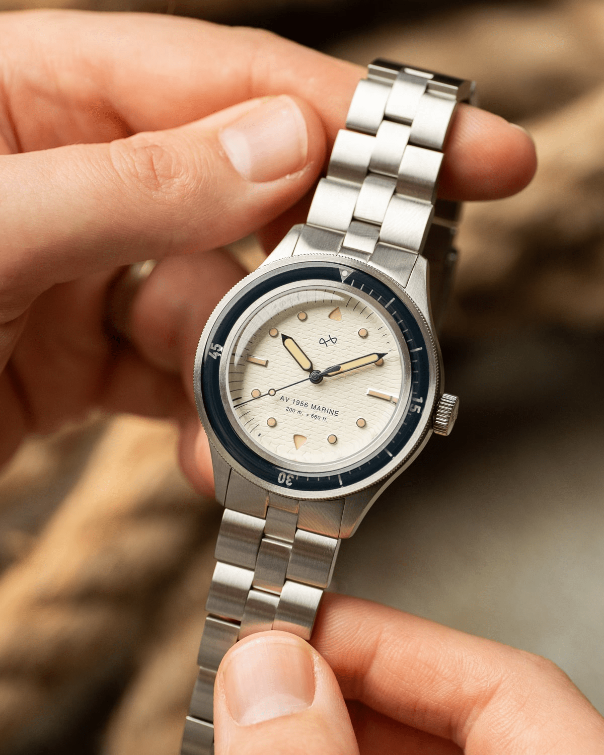 1956 Marine by AV86 vintage-inspired diver with acrylic bezel, luminous markers, sapphire crystal, and metal bracelet strap