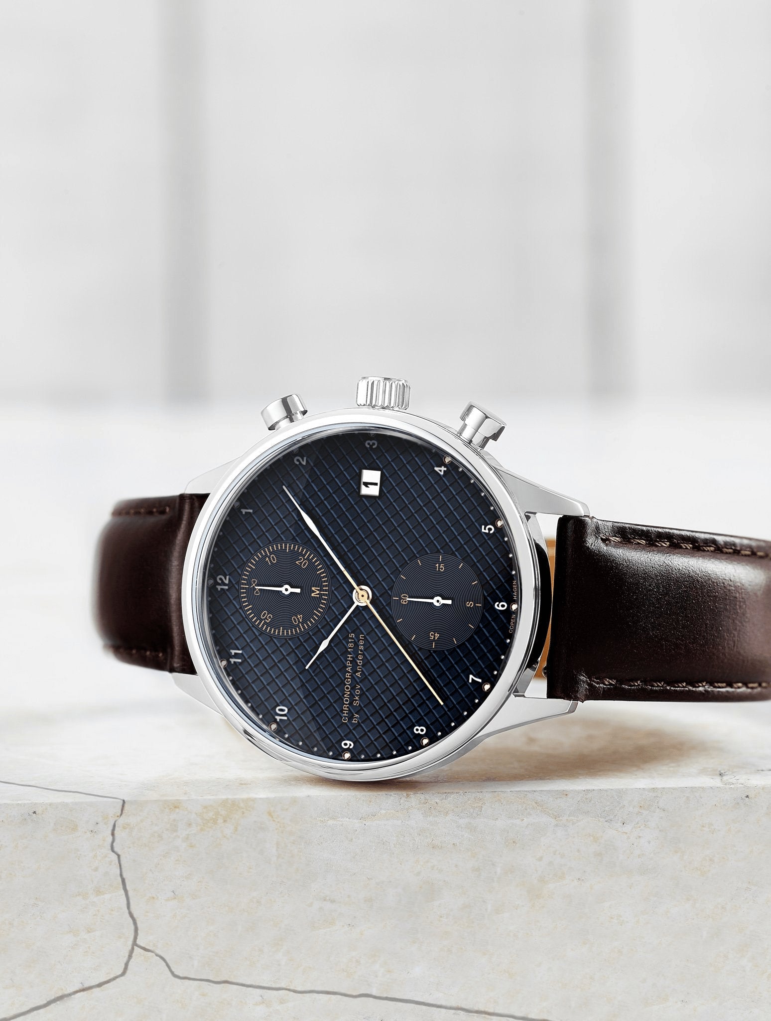 1815 Chronograph by AV86, vintage-inspired chronograph with textured dial, sapphire crystal, and brown leather strap