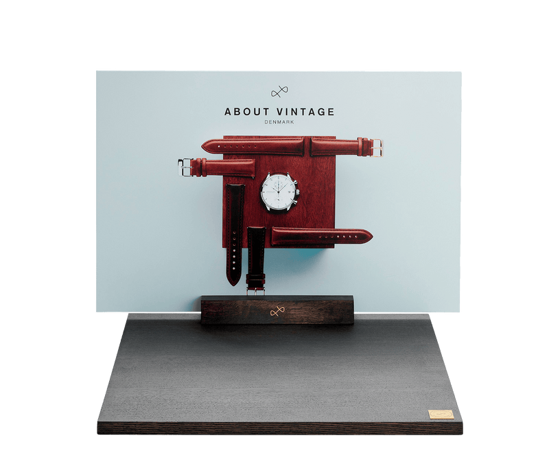 Boards by AV86 minimalist watch display stand with wooden base and leather strap holders for luxury timepieces