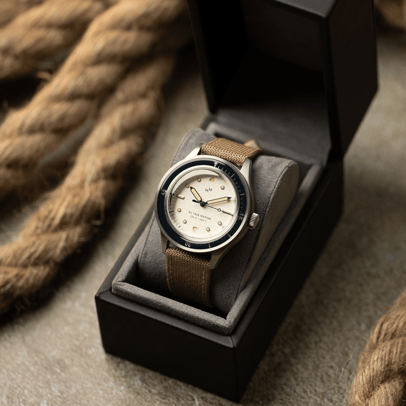1956 Marine by AV86 vintage-inspired diver with acrylic bezel, luminous markers, and textured fabric strap in presentation box