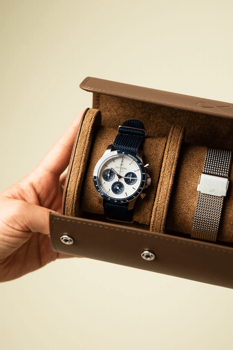 1960 Racing Chronograph by AV86 vintage-inspired chronograph with sapphire crystal, navy fabric strap, and additional metal bracelet