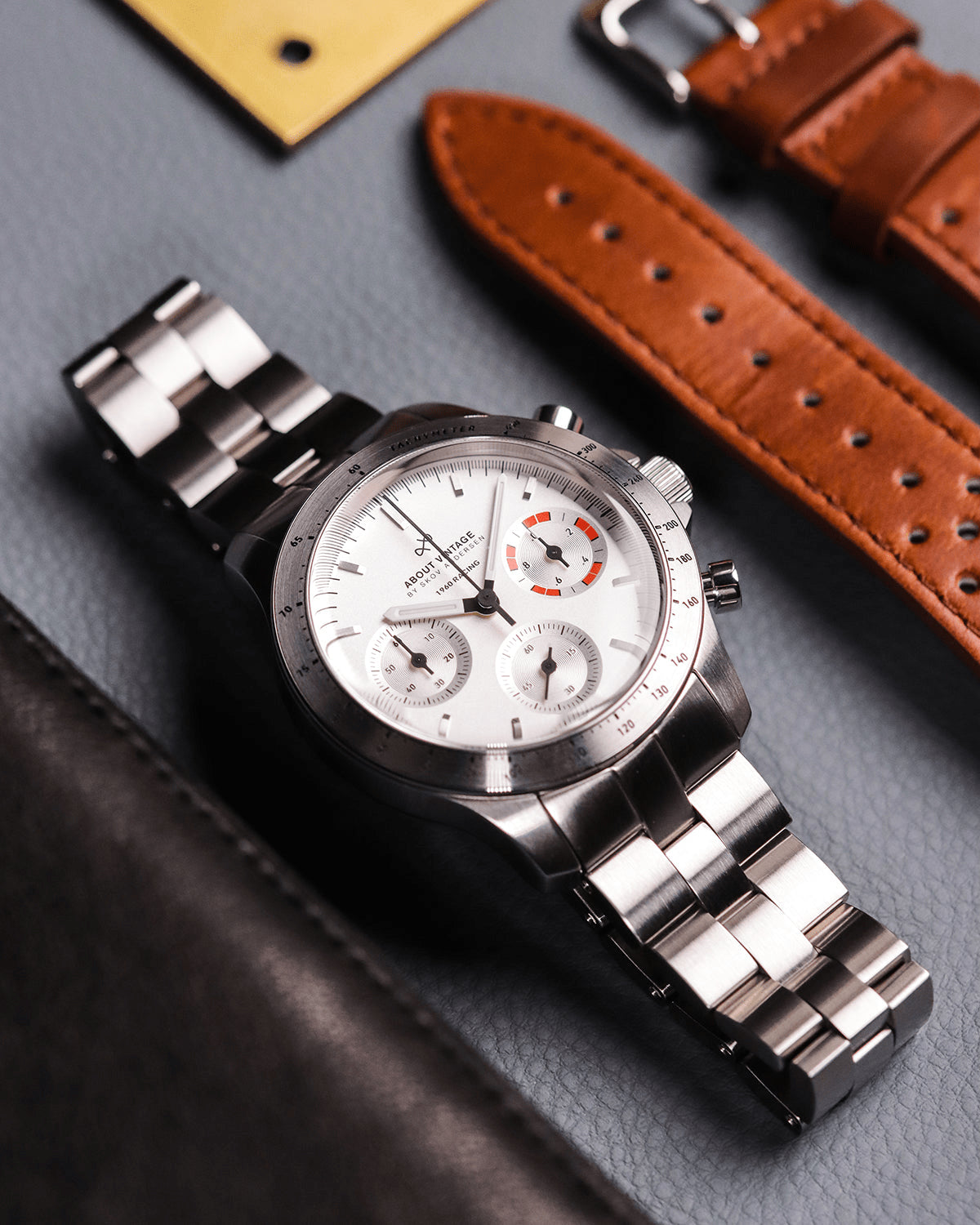1960 Racing Chronograph by AV86 with vintage-inspired dial, sapphire crystal, tachymeter bezel, and brushed steel bracelet strap