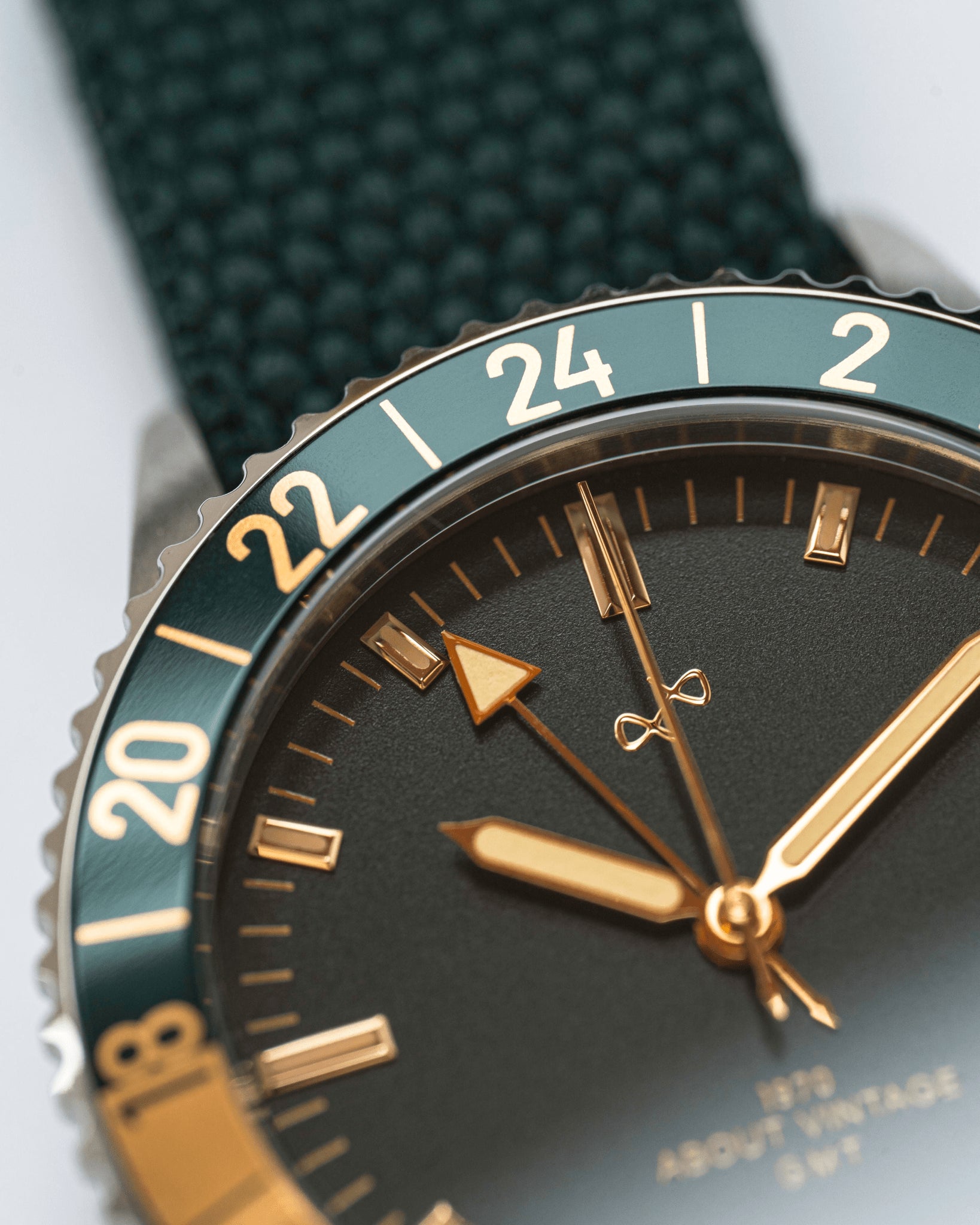 1970 Haagen GMT Automatic by AV86 with vintage-inspired dial, 24-hour bezel, sapphire crystal, and textured fabric strap