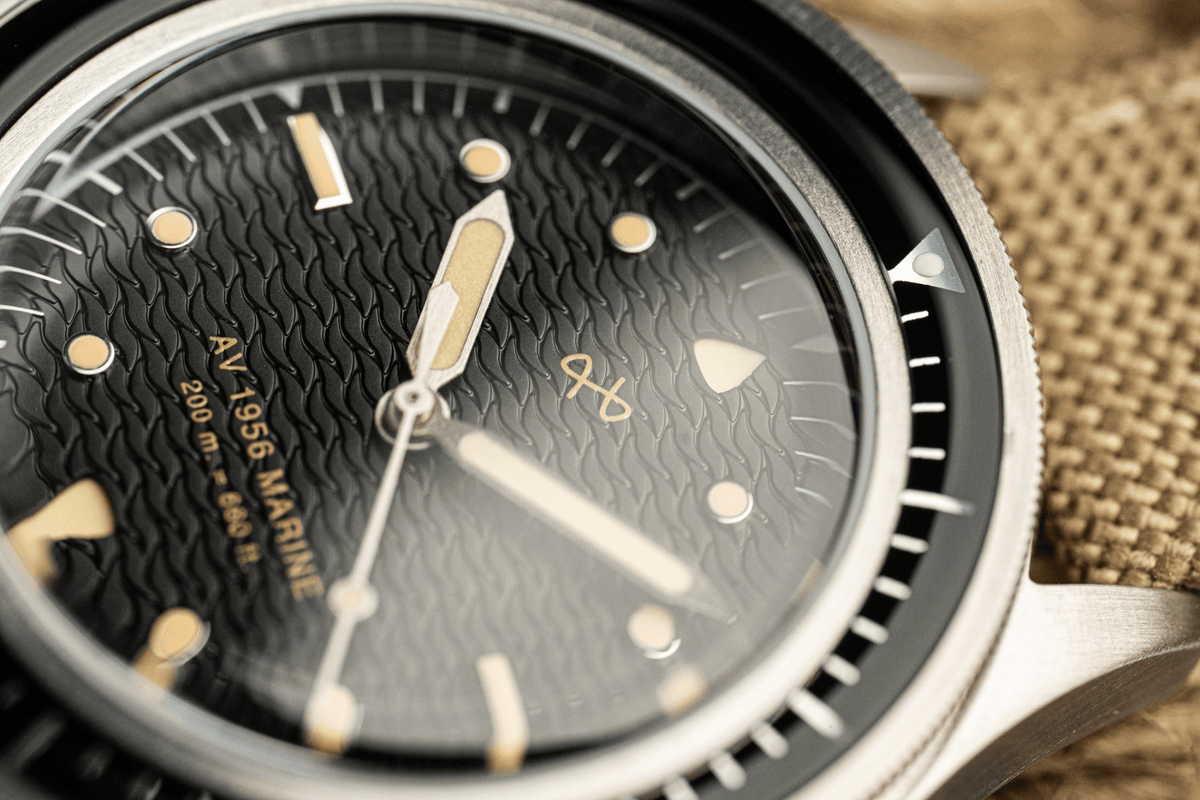 1956 Marine by AV86 vintage-inspired diver with acrylic bezel, luminous markers, textured dial, and stainless steel case
