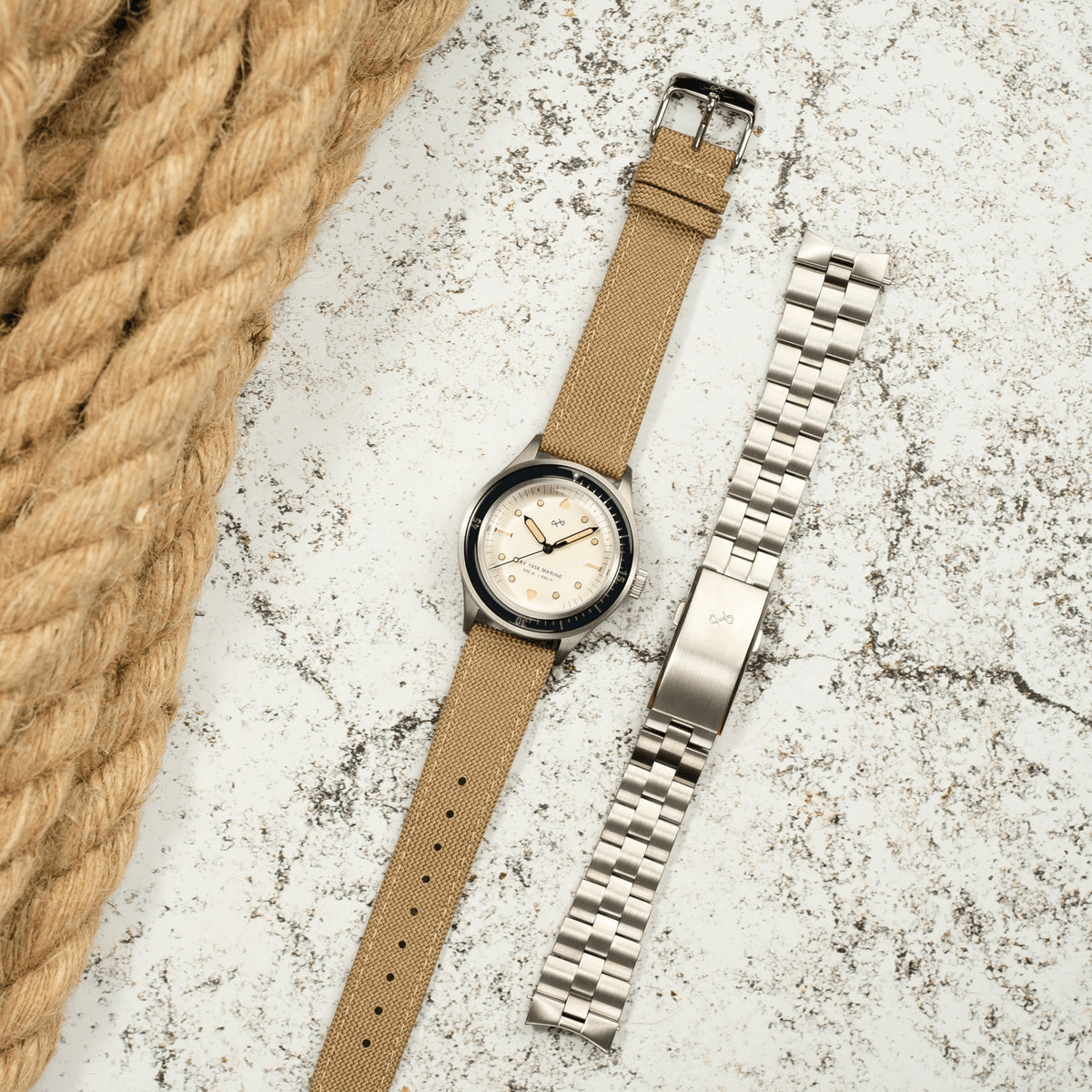 1956 Marine by AV86 vintage-inspired diver with acrylic filled bezel, luminous markers, fabric strap and additional metal bracelet strap
