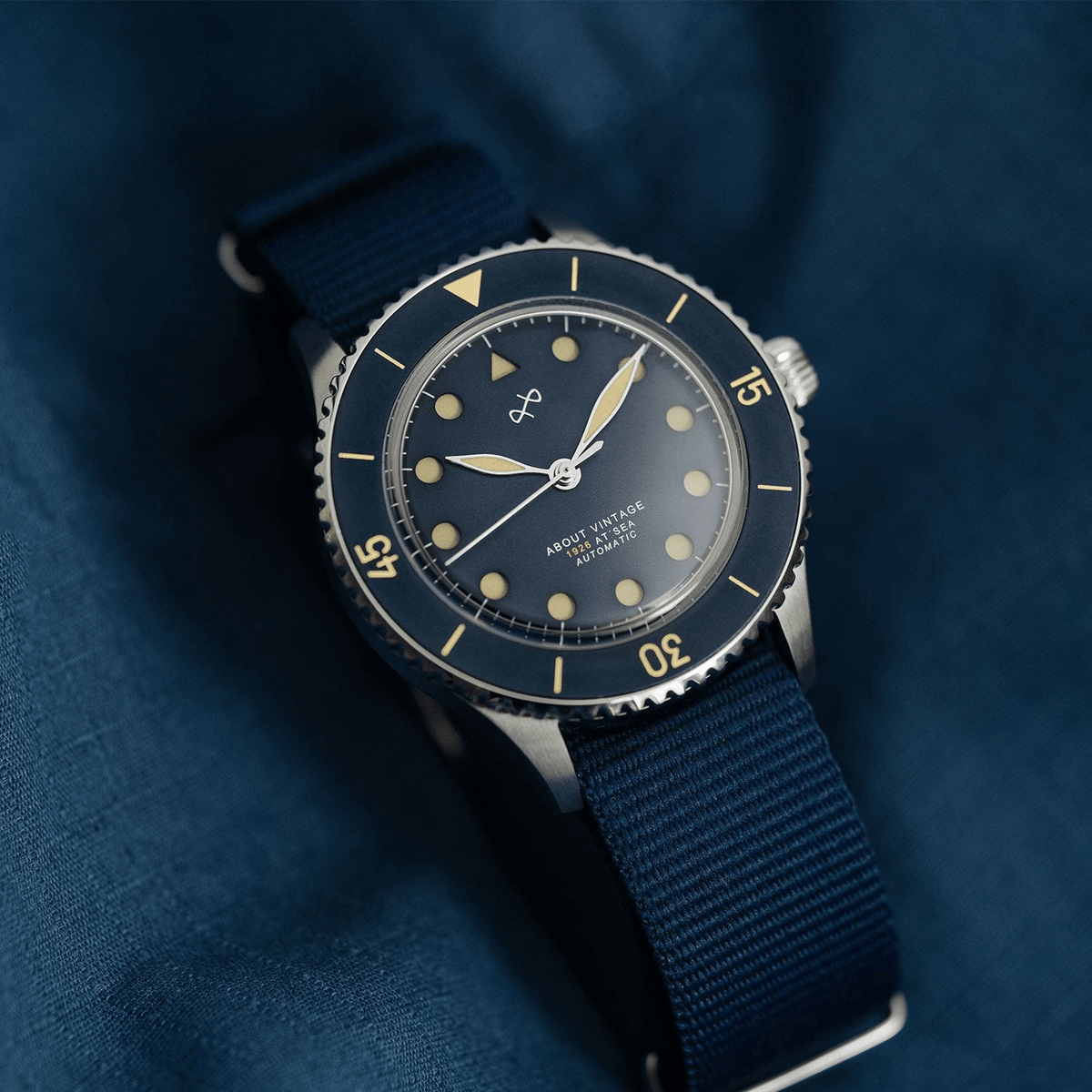 1926 Automatic by AV86 vintage-inspired diver with sapphire crystal, compass bezel, and blue fabric strap