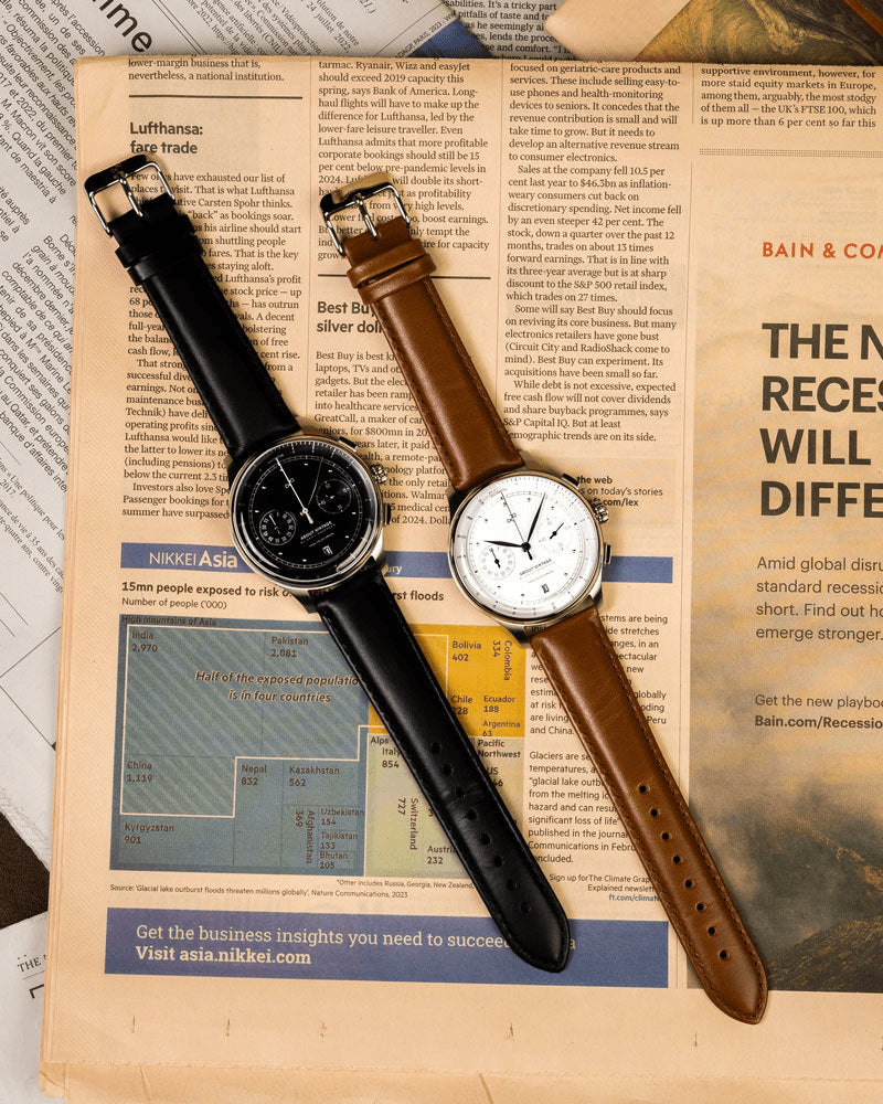 1934 Telechron, Steel / Black by AV86, a vintage-inspired chronograph featuring a polished case, dual subdials, date window, sapphire crystal, and a smooth black leather strap embodying Nordic minimalism and horological precision.