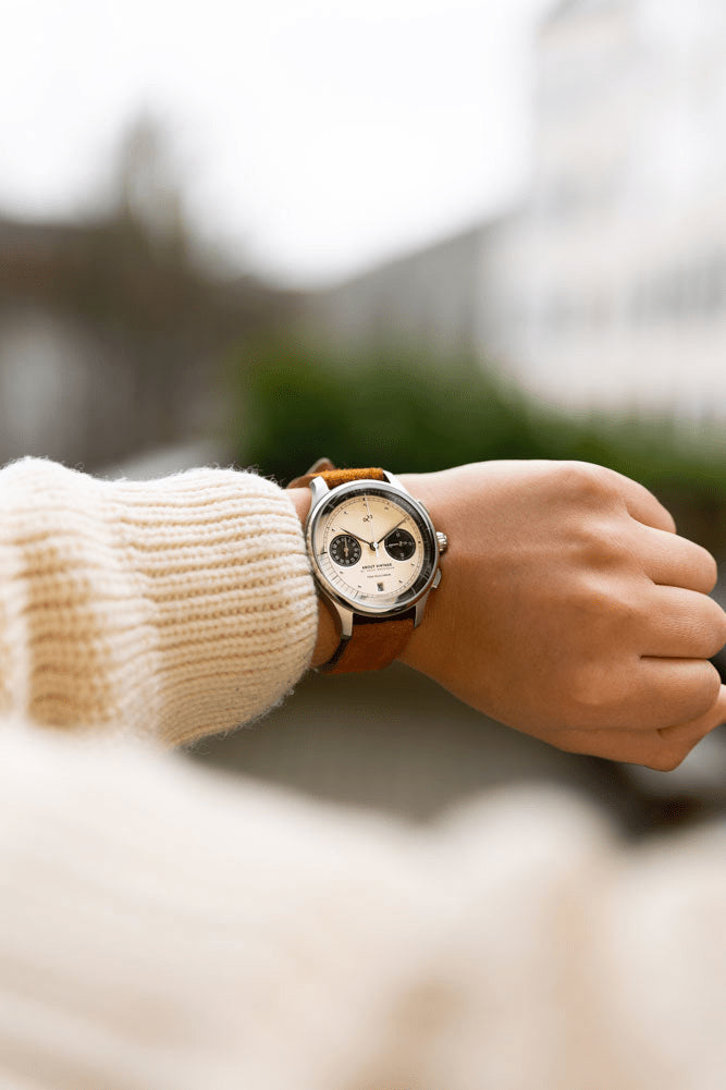 1934 Telechron by AV86 vintage-inspired chronograph with telemeter, sapphire crystal, and brown leather strap on wrist outdoors