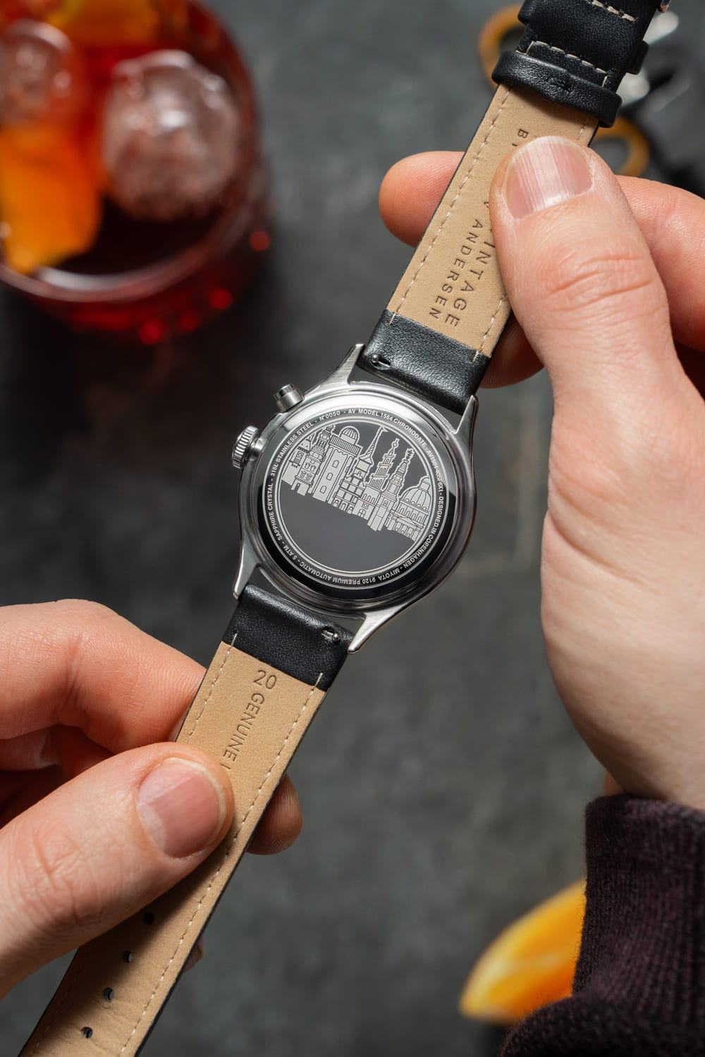 1564 Chronodate Automatic by AV86 with engraved case back, vintage-inspired automatic movement, and black leather strap