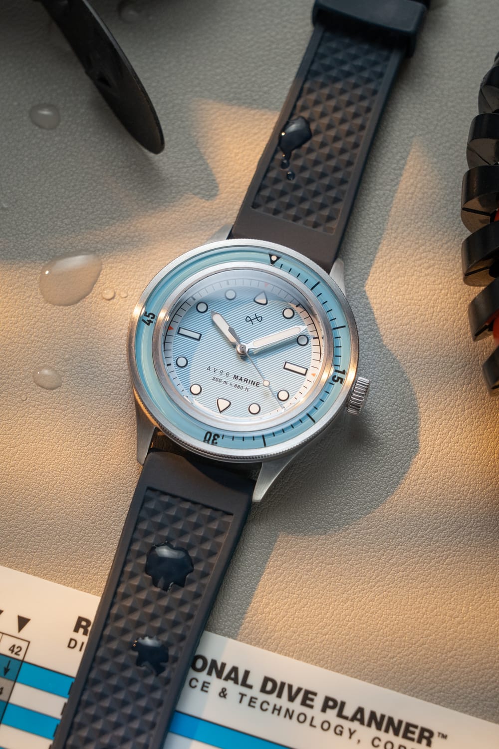 1956 Marine by AV86 vintage-inspired diver watch with sapphire crystal, compass bezel, and textured rubber strap