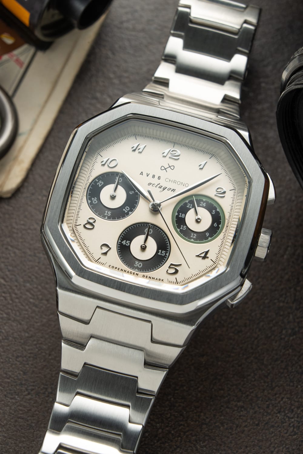 1904 Chrono, Steel / Off White & Black from AV86 featuring a distinctive octagonal stainless steel case, chronograph function with three subdials, elegant numeral markers, and a polished steel bracelet showcasing Scandinavian horological design and luxury craftsmanship.