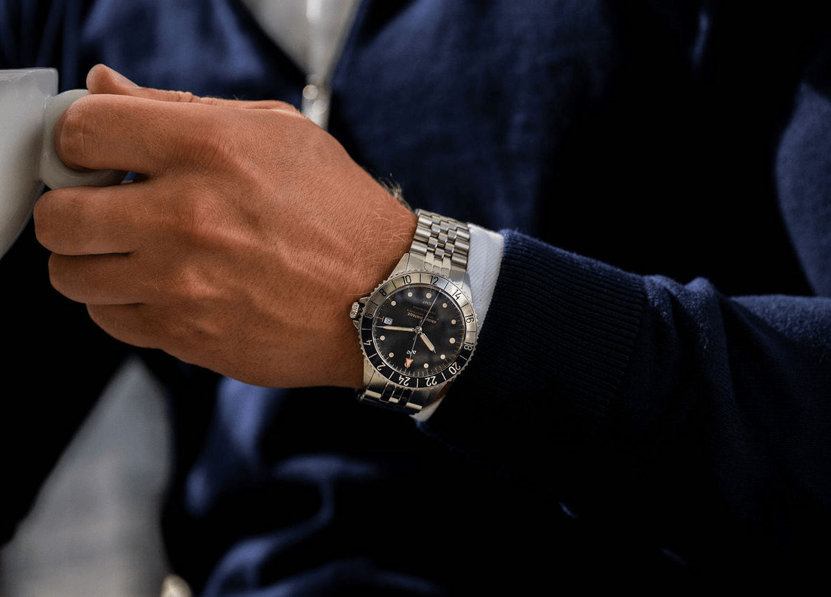 1982 GMT World Traveler by AV86 luxury GMT watch with vintage-inspired dial, sapphire crystal, compass bezel, and metal bracelet strap