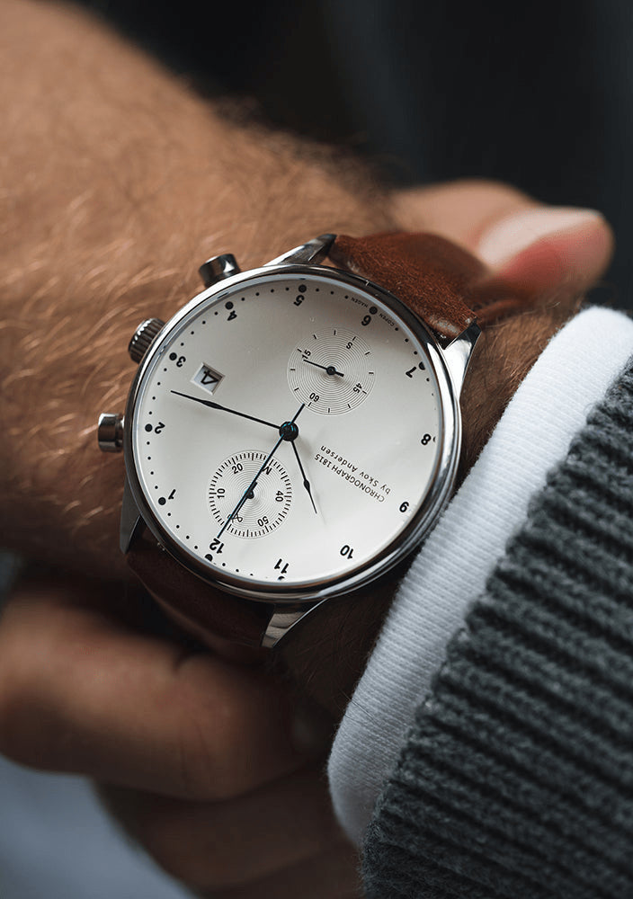 1815 Chronograph by AV86 with vintage-inspired dial, chronograph function, sapphire crystal, and brown leather strap on wrist