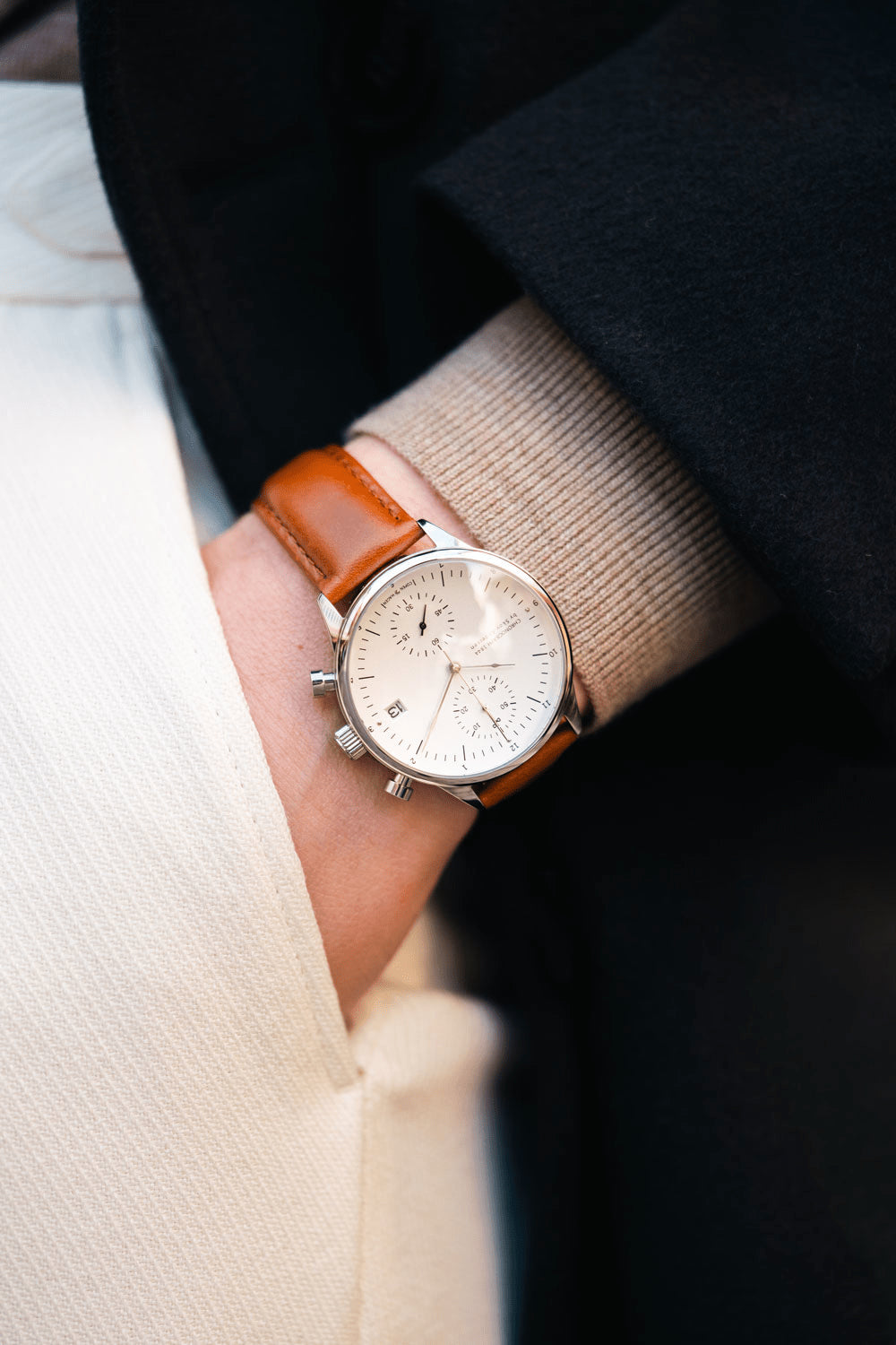 1844 Chronograph by AV86 with vintage-inspired dial, sapphire crystal, precision chronograph, and brown leather strap in minimalist attire