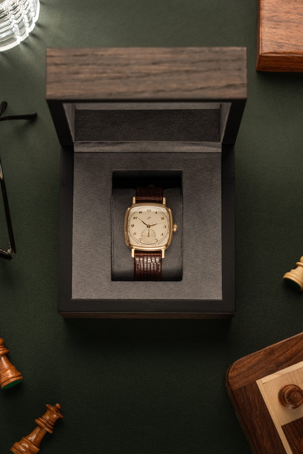 Vintage-inspired AV86 dress watch with cushion case, mechanical small seconds dial, and textured leather strap displayed in presentation box.