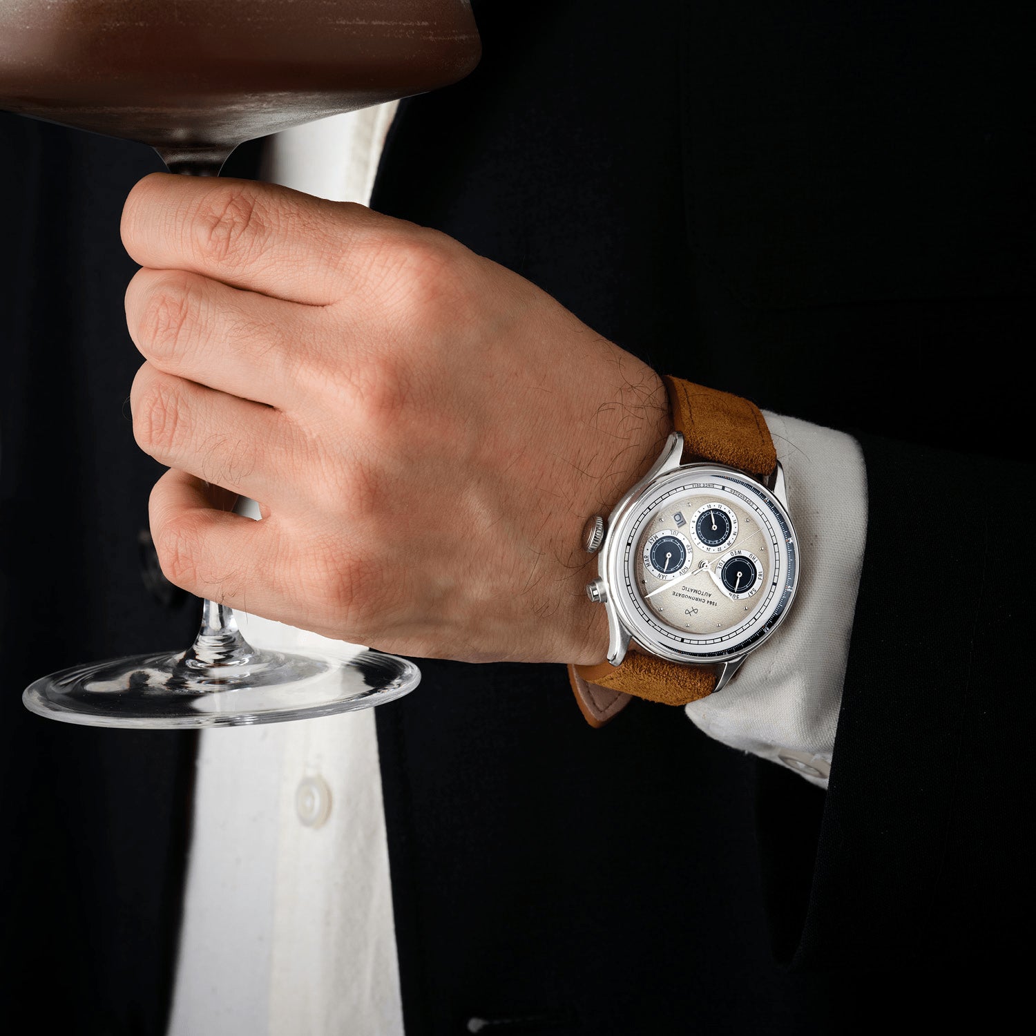 1564 Chronodate Automatic by AV86 luxury vintage-inspired chronograph with sapphire crystal and brown leather strap on wrist