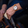 1564 Chronodate Automatic by AV86 wristwatch with vintage chronograph dial, sapphire crystal, and tan leather strap in casual setting