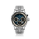 1564 Chronodate Automatic, Steel / Blue by AV86 features a vintage-inspired automatic chronograph with a sunburst blue dial, three cream subdials for day, month, and 24-hour time, housed in a polished stainless steel case with sapphire crystal, paired with a brushed steel bracelet, exemplifying Danish design and Nordic minimalism.