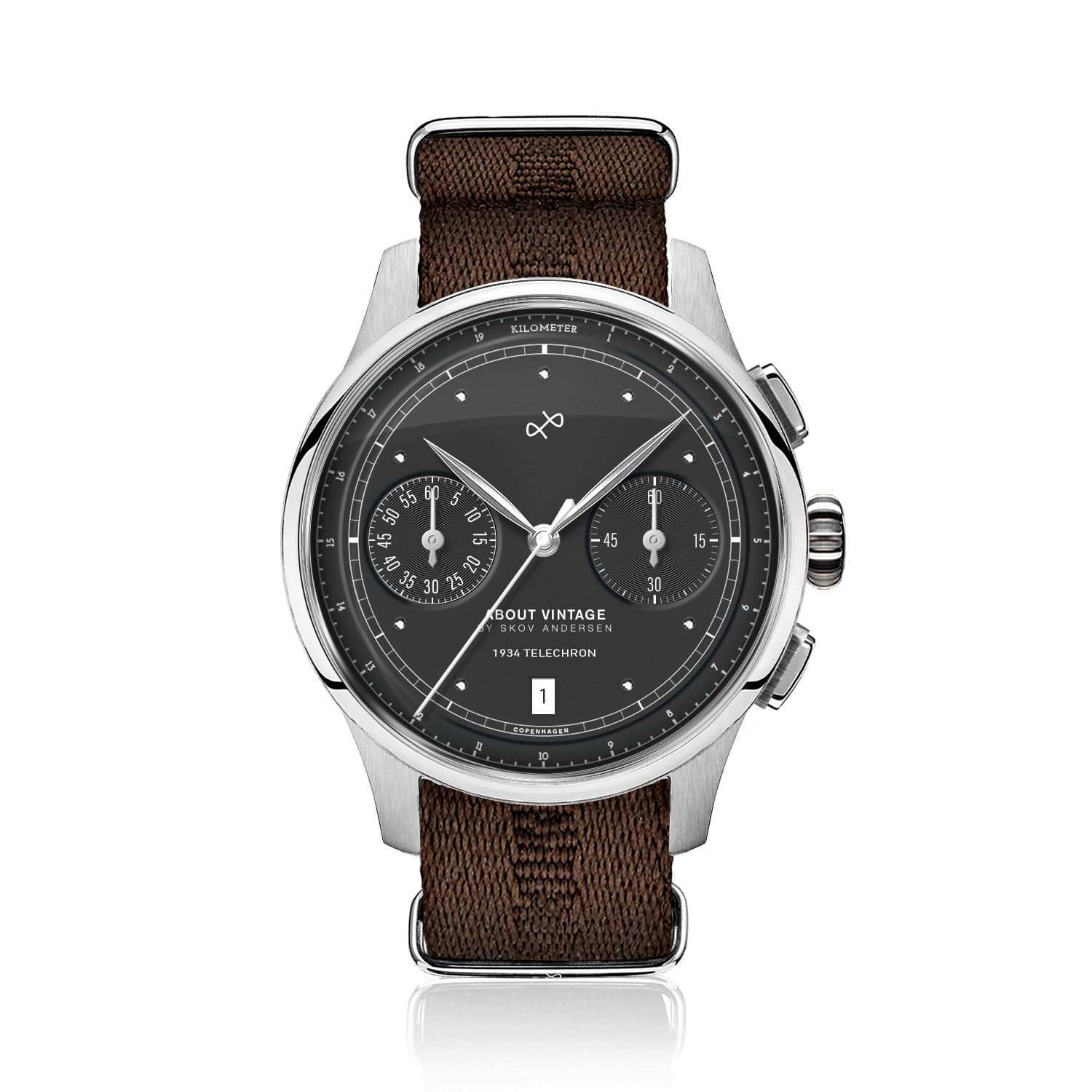 1934 Telechron, Steel / Black by AV86 showcases a vintage-inspired chronograph with a black dial, dual subdials, date window, polished steel case, sapphire crystal, and a textured brown NATO strap, reflecting Scandinavian horological excellence and minimalist design.