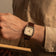 1954 Amalfi Mechanical, Steel / Off White wristwatch by AV86 with vintage-inspired design and brown leather strap on wrist