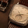Close-up of 1954 Amalfi Mechanical, Steel / Off White watch with brown textured leather strap by AV86, highlighting vintage-inspired detail.
