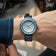 1956 Marine by AV86 vintage-inspired diver with compass bezel, sapphire crystal, and textured rubber strap on wrist