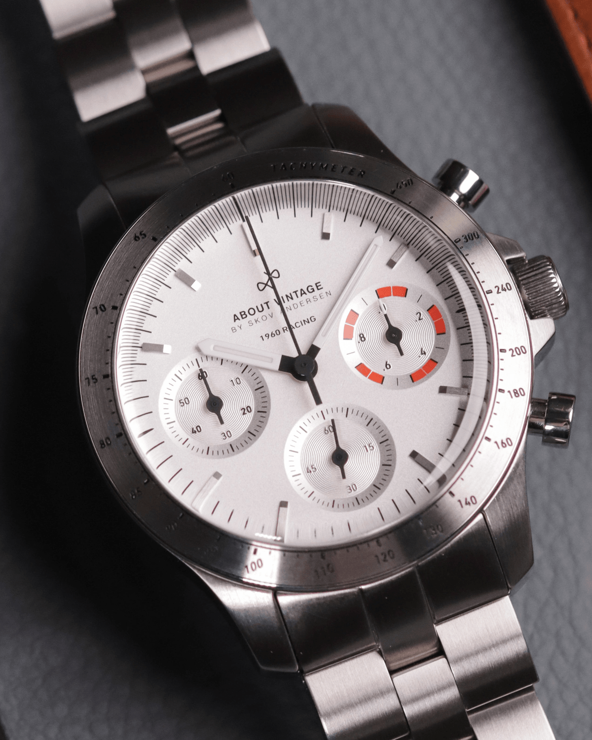 1960 Racing Chronograph by AV86 with vintage-inspired dial, tachymeter bezel, sapphire crystal, and stainless steel bracelet strap