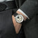 1968 Mechanical (Hand-Wound) by AV86 vintage-inspired dress watch with sapphire crystal and black leather strap on wrist