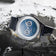 1968 Moonphase by AV86 luxury Moonphase watch with sapphire crystal, textured dial, and black leather strap in artistic setting