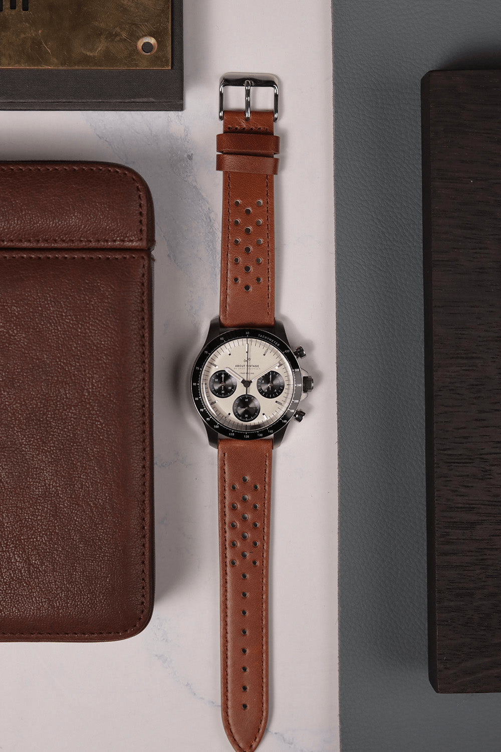 1960 Racing Chronograph by AV86 with vintage-inspired dial, sapphire crystal, chronograph subdials, and perforated leather strap