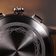Close-up of the brushed caseback of the 1934 Telechron by AV86, featuring engraved vintage-inspired detailing and a brown leather strap, highlighting craftsmanship and Scandinavian design.