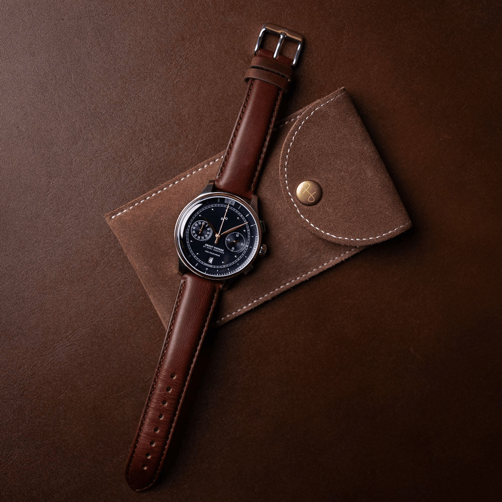 1934 Telechron by AV86 vintage-inspired chronograph with telemeter, sapphire crystal, and brown leather strap on suede pouch