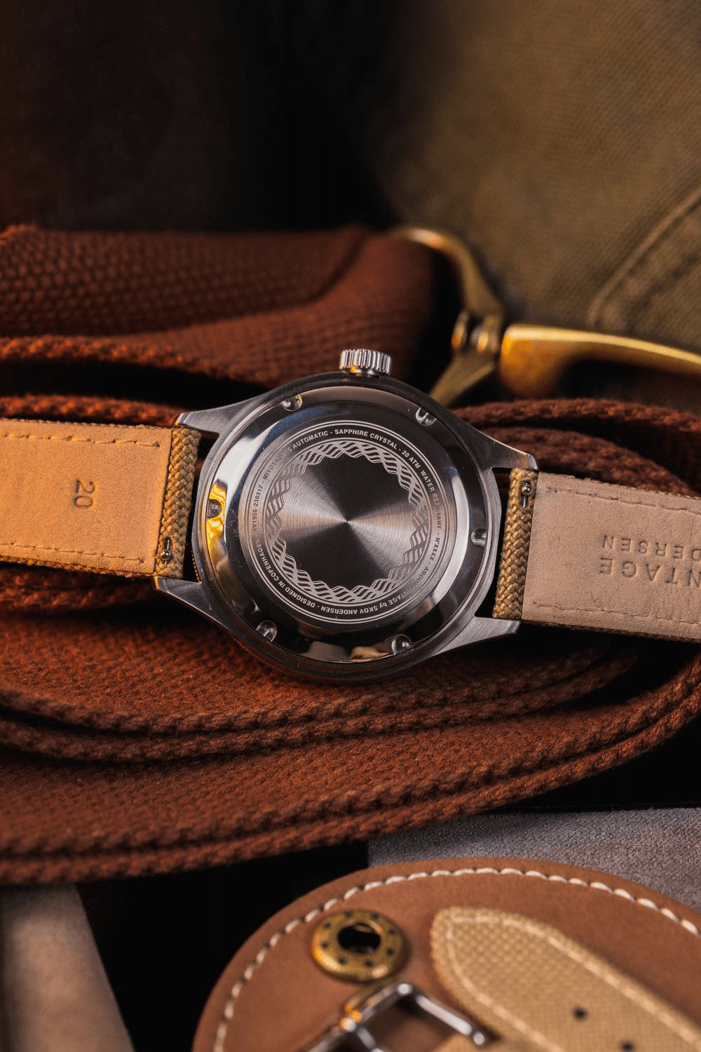 1956 Marine Automatic by AV86 showcasing engraved stainless steel case back with automatic movement and leather strap