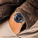 1956 Marine Automatic by AV86 vintage-inspired diver with sapphire crystal, rotating bezel, and fabric strap in casual leather jacket setting