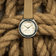 1956 Marine by AV86 vintage-inspired diver with acrylic bezel, luminous markers, and textured fabric strap on nautical rope background