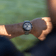 1960 Racing Chronograph by AV86 vintage-inspired chronograph with sapphire crystal, steel case, and metal bracelet strap on wrist outdoors