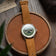 1968 Moonphase with vintage-inspired green guilloché dial, moonphase complication, sapphire crystal, and tan suede leather strap by AV86