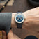 1968 Moonphase by AV86 vintage-inspired moonphase watch with sapphire crystal, moonphase dial, and dark leather strap on wrist