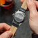 1564 Chronodate Automatic by AV86 with engraved case back, vintage-inspired automatic movement, and black leather strap
