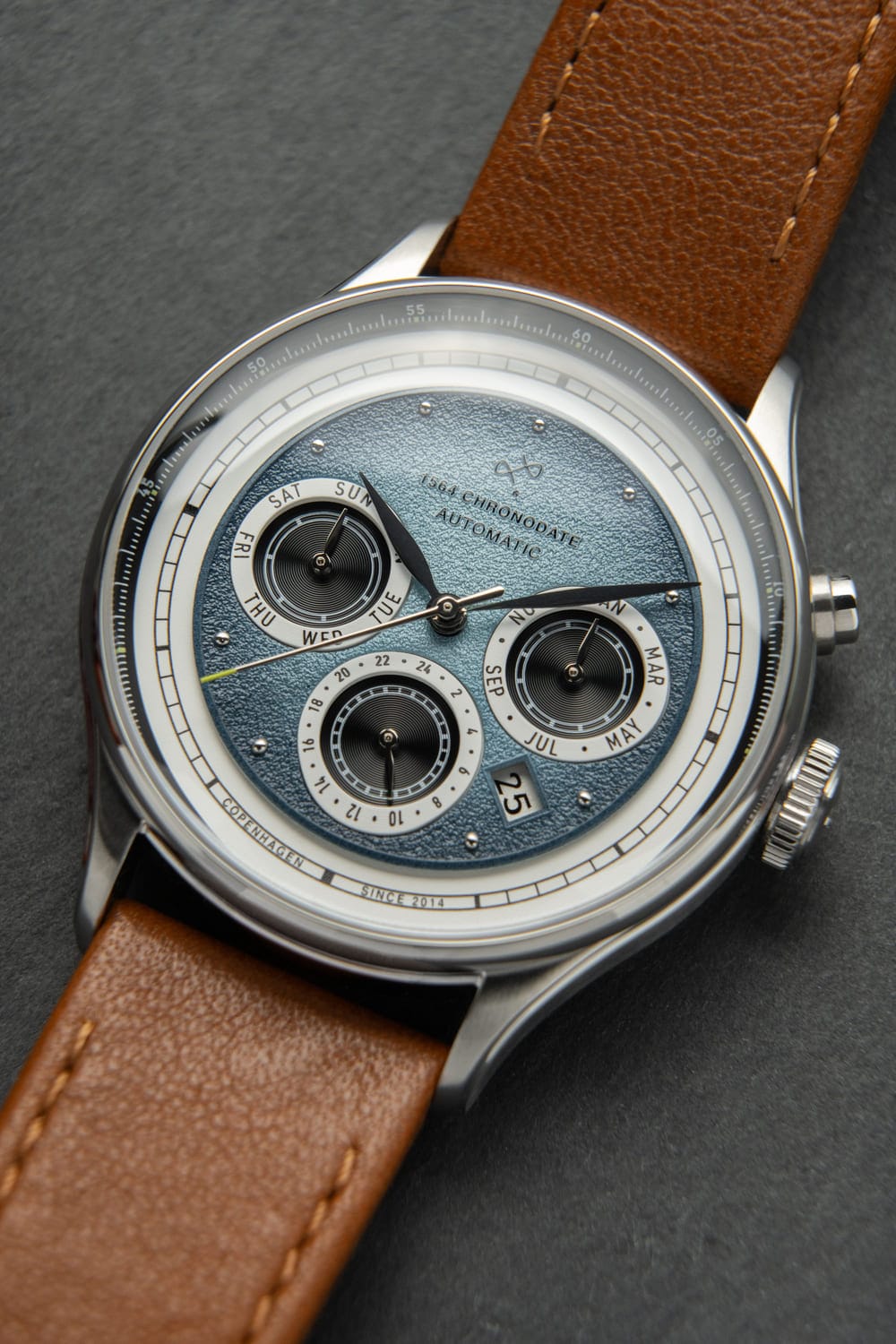 1564 Chronodate Automatic by AV86 vintage-inspired automatic watch with textured dial, sapphire crystal, and brown leather strap