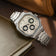 1904 Chrono, Steel / Off White & Black by AV86 features a refined chronograph dial with sapphire crystal, stainless steel case, and integrated bracelet, exuding Nordic minimalism and horological excellence.