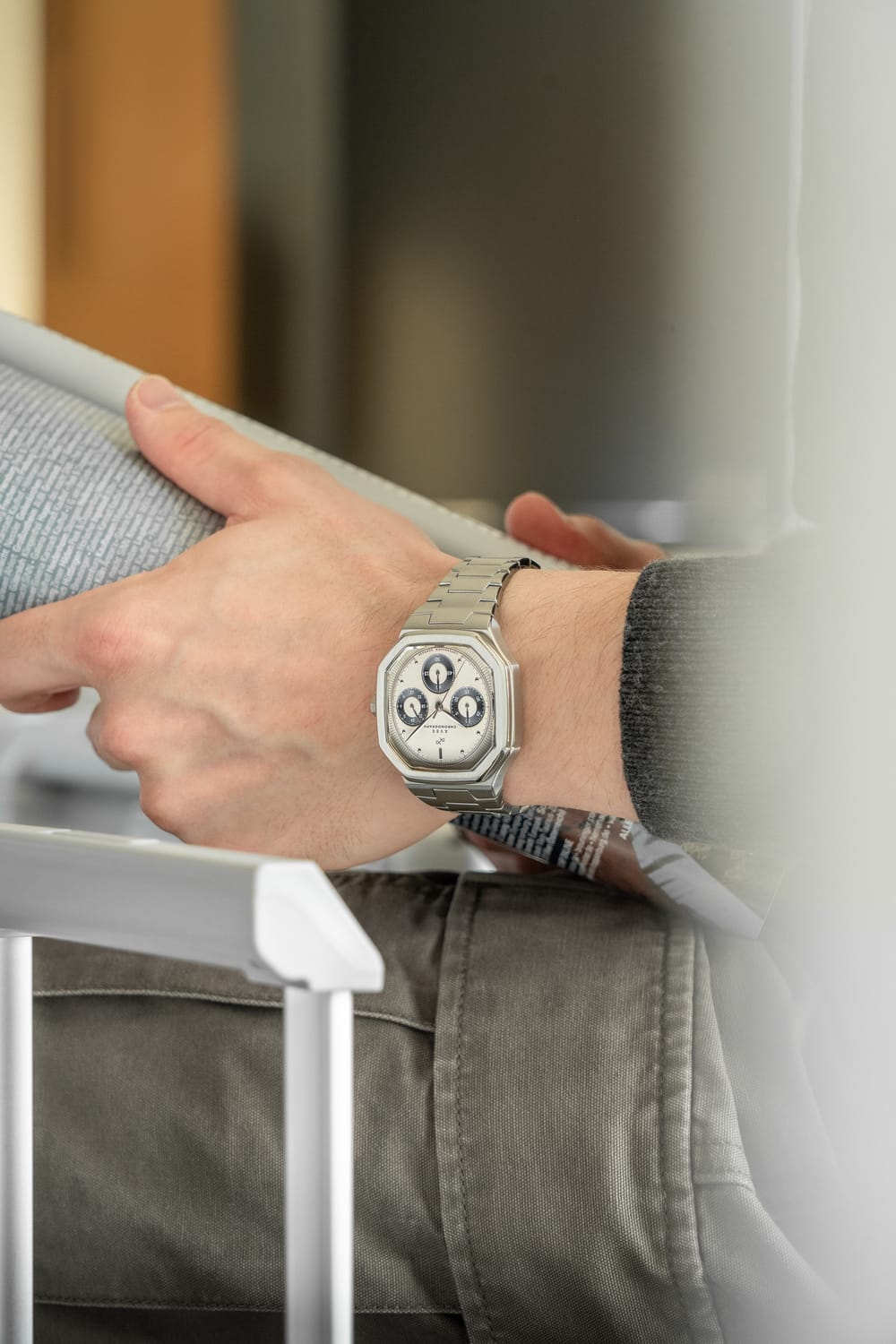 1904 Chronograph by AV86 with angular case, sapphire crystal, vintage-inspired dial, and stainless steel bracelet strap