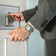 1904 Chronograph by AV86 luxury chronograph with angular case, sapphire crystal, and steel metal bracelet in business setting