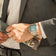 1904 Chronograph by AV86 with angular case, vintage-inspired dial, sapphire crystal, and stainless steel bracelet strap on wrist in formal attire