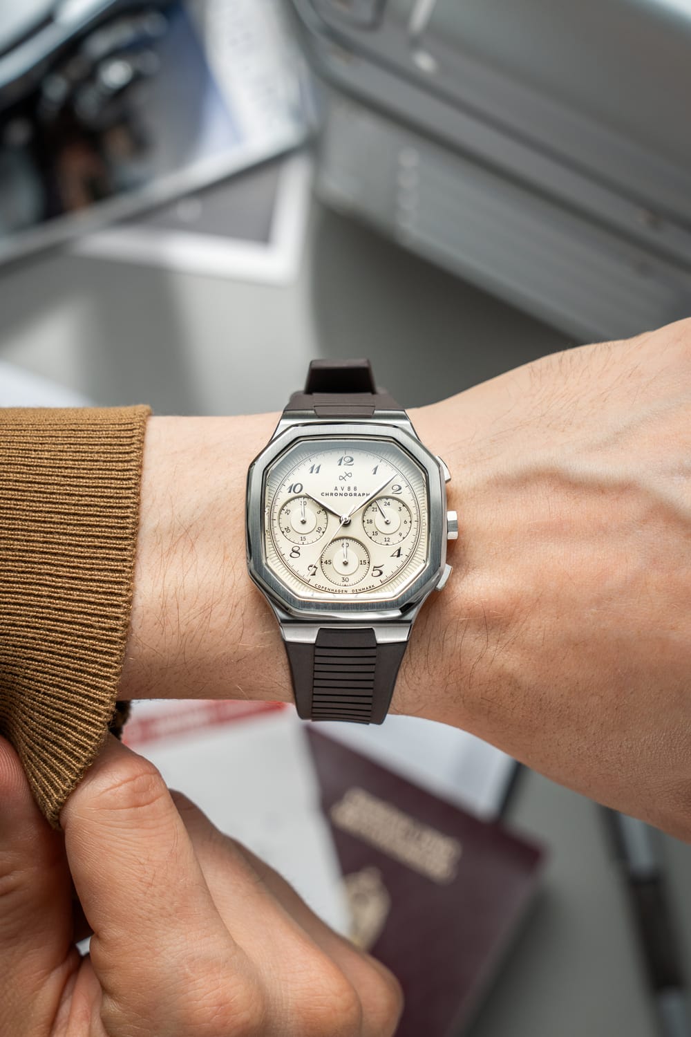 1904 Chronograph by AV86 with angular case, sapphire crystal, chronograph subdials, and textured rubber strap, Nordic minimalist design