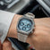 1904 Chronograph by AV86 with angular case, vintage-inspired dial, sapphire crystal, and textured rubber strap in neutral tone
