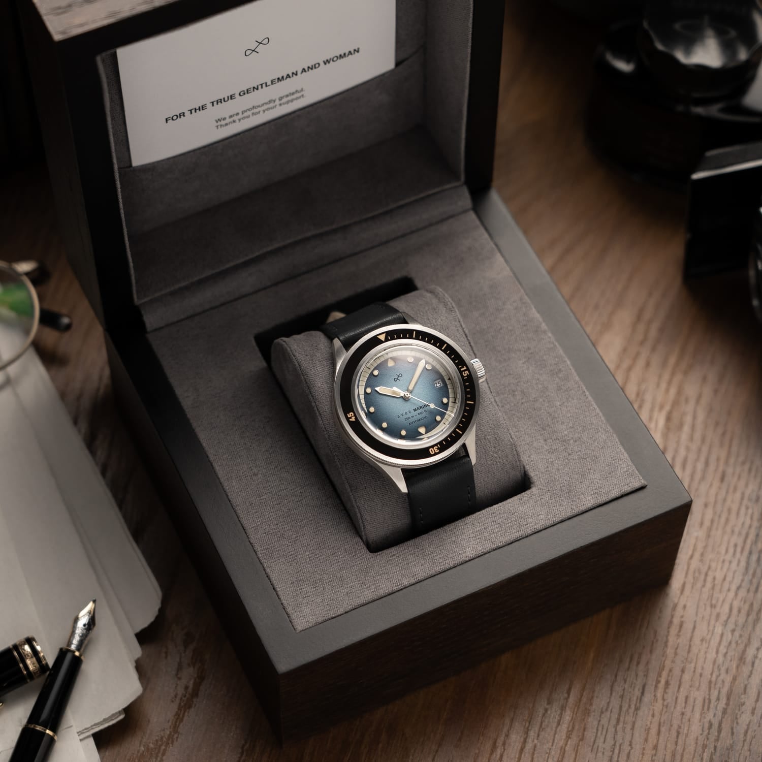 1956 Marine Automatic, Steel / Blue Fade luxury timepiece by AV86 with blue fade dial and sleek steel case in presentation box