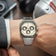1904 Chronograph by AV86 with angular case, vintage-inspired dial, sapphire crystal, chronograph subdials, and brushed metal bracelet strap